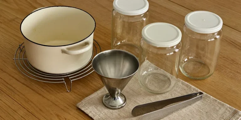 Canning starter set with enamel pot, rack, jars, funnel and tongs