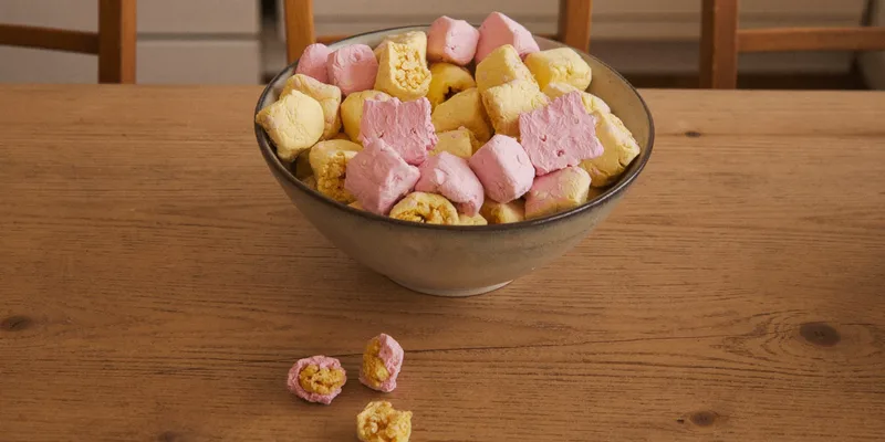 Bowl of puffed pastel freeze dried candy pieces